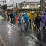 Bajo la lluvia, miles de fieles iniciaron la tradicional peregrinación a Luján